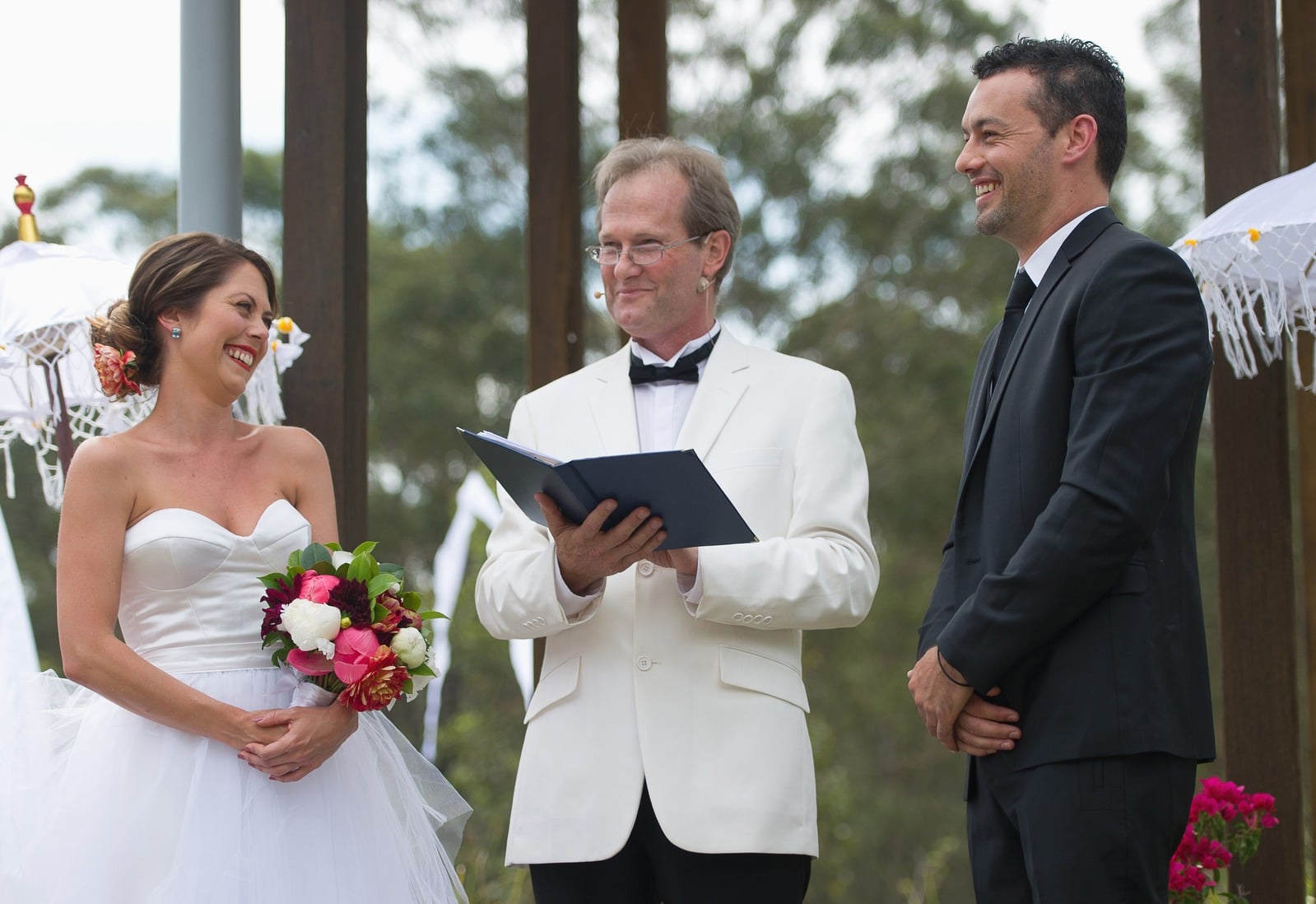Philip Holland officiating an outdoor wedding ceremony